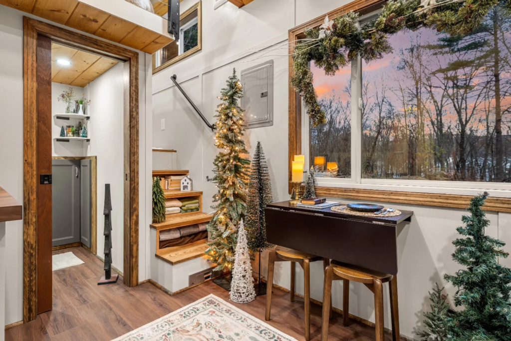 The Spruce's bedroom is reached by storage-integrated staircase