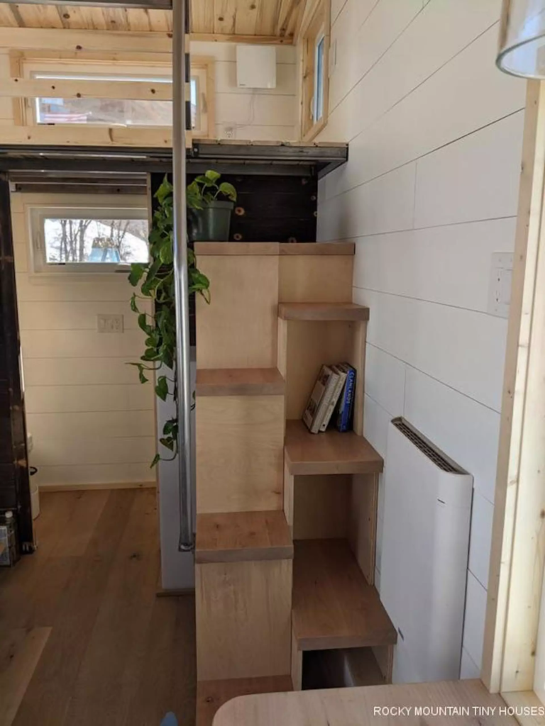 The Boulder 2.5 includes a loft bedroom, which is reached by a space-saving alternating tread staircase