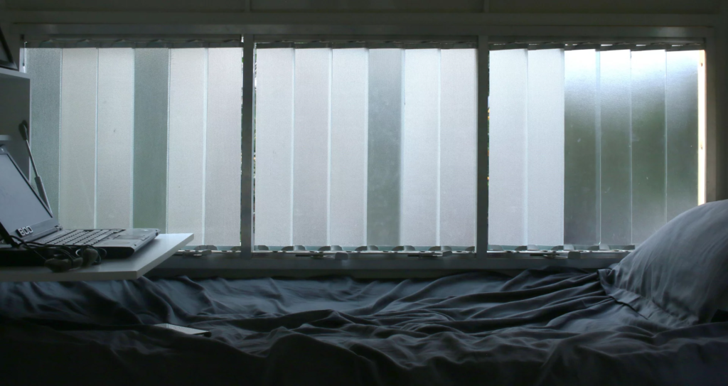 The Solo 01's bedroom includes a small bed