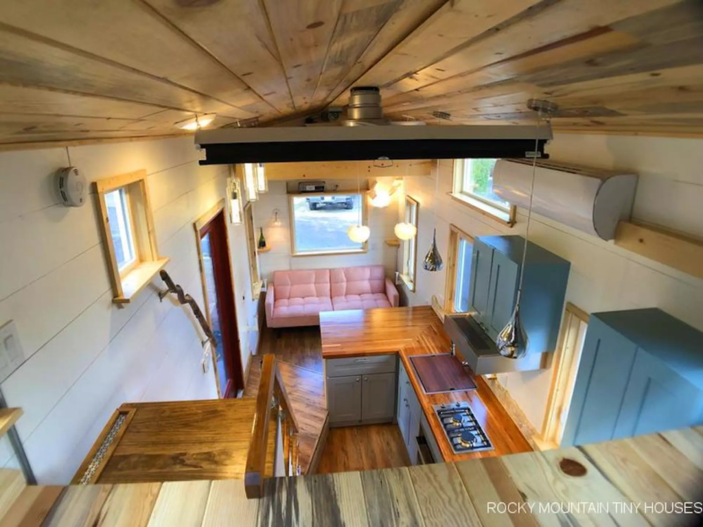 The Bradford 26' Tiny House includes a secondary loft bedroom that's reached by storage-integrated staircase