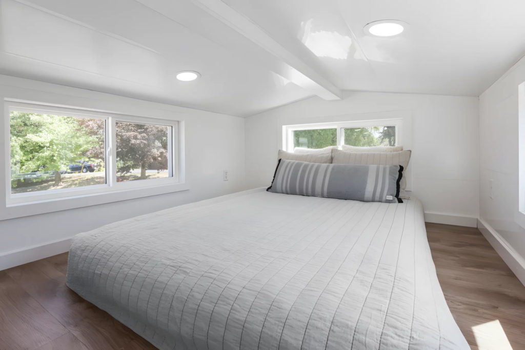 The Cercaux's bedroom includes a double bed and some more storage