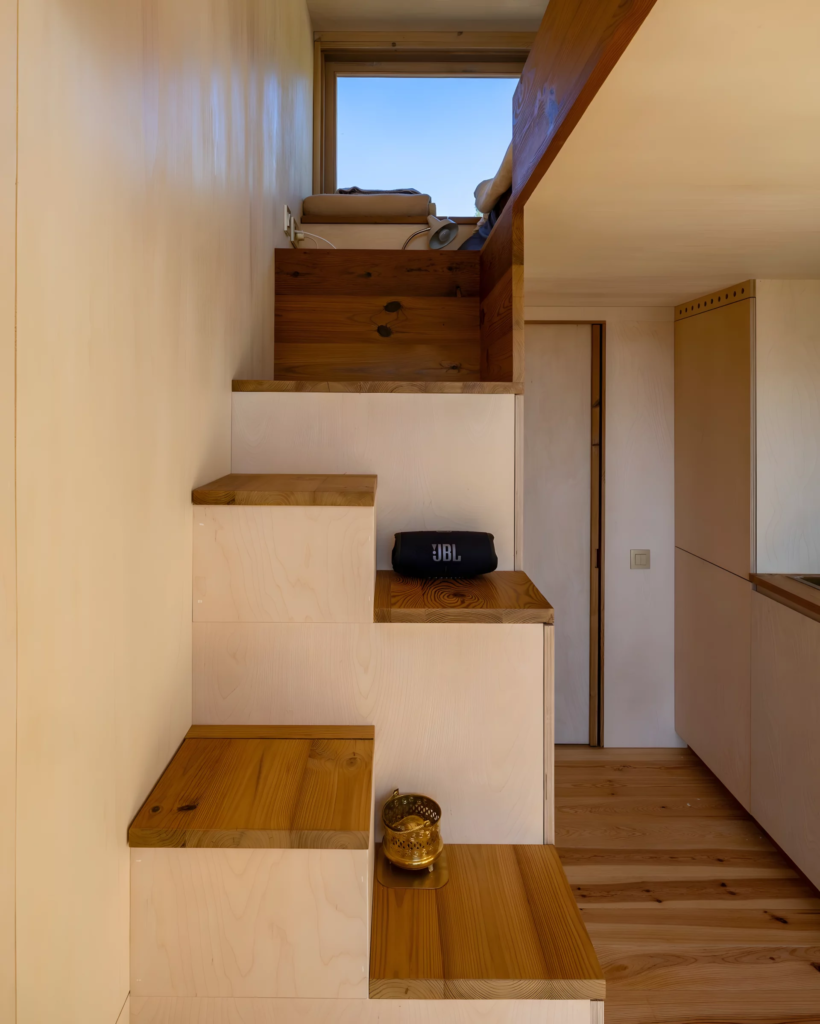 A space-saving alternating tread staircase leads up to the Duna's bedroom